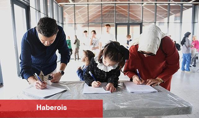 Tarihi koşuya katılacak sporseverler numaralarını aldı - Haberois Tarihi koşuya katılacak sporseverler numaralarını aldı